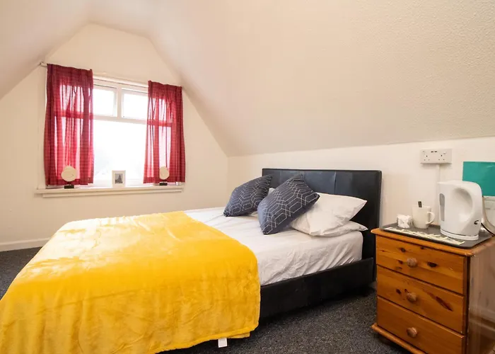 Pebbles Guest House Quad Room 10